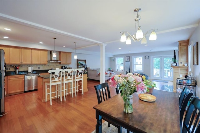41 Webber St Unit 2, Malden, MA 02148 - dining area featuring light wood-style floors, recessed lighting, a chandelier, and decorative columns