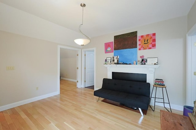41 Webber St Unit 2, Malden, MA 02148 - living area with wood finished floors and a fireplace