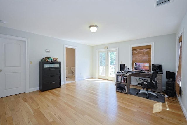 41 Webber St Unit 2, Malden, MA 02148 - home office with light wood-style flooring and french doors