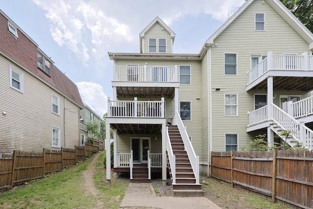 41 Webber St Unit 2, Malden, MA 02148 - back of house featuring stairway, a fenced backyard, and a wooden deck