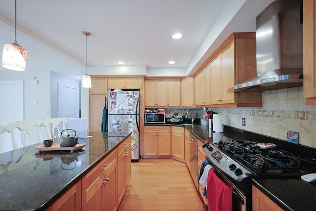 41 Webber St Unit 2, Malden, MA 02148 - kitchen with black range with gas stovetop, freestanding refrigerator, wall chimney range hood, light wood-style floors, and decorative backsplash