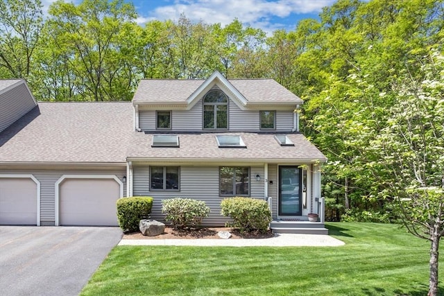 3 Dogwood Cir Unit 3, Franklin, MA 02038 - view of front of home with an attached garage, a front yard, driveway, and roof with shingles