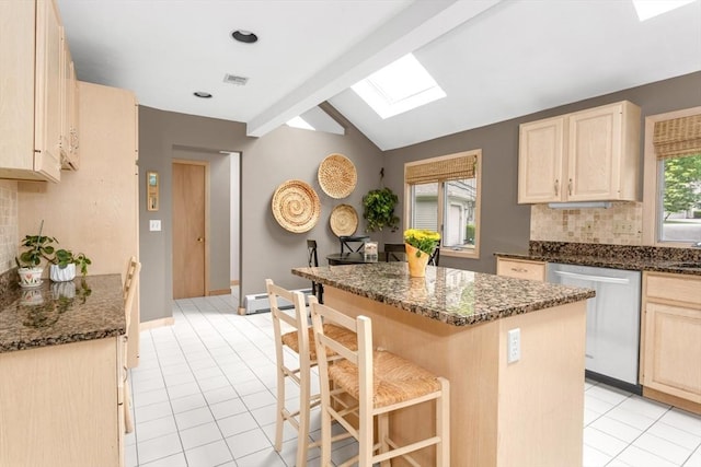 3 Dogwood Cir Unit 3, Franklin, MA 02038 - kitchen featuring dishwasher, a skylight, light brown cabinets, a kitchen island, and tasteful backsplash