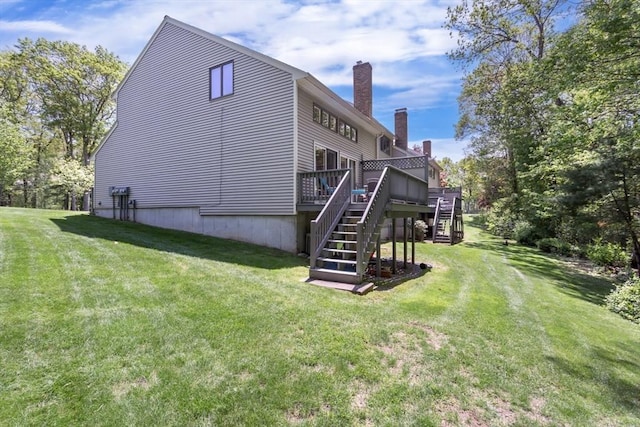 3 Dogwood Cir Unit 3, Franklin, MA 02038 - view of side of home featuring stairs, a wooden deck, a yard, and a chimney