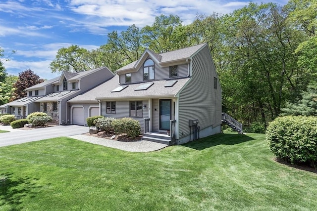 3 Dogwood Cir Unit 3, Franklin, MA 02038 - view of front of home featuring a garage, driveway, a front lawn, and roof with shingles