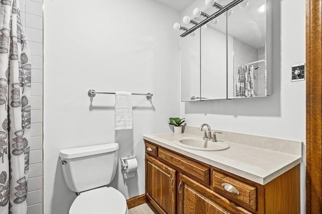 22 Grove Pl Unit 4, Winchester, MA 01890 - full bathroom with toilet, vanity, and a shower with curtain