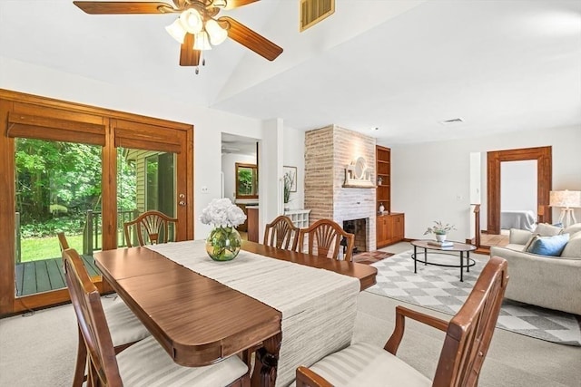 22 Grove Pl Unit 4, Winchester, MA 01890 - dining space featuring light colored carpet, ceiling fan, a fireplace, and lofted ceiling