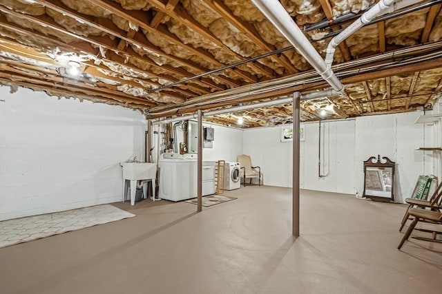 22 Grove Pl Unit 4, Winchester, MA 01890 - unfinished basement featuring independent washer and dryer and a sink