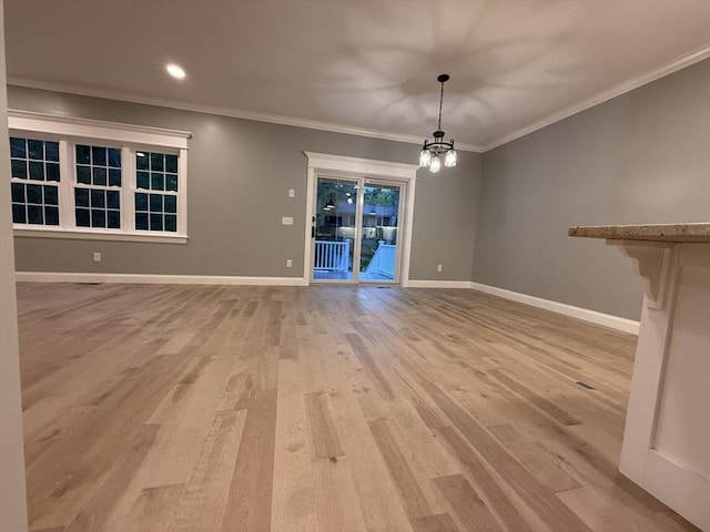 24 Cooper Rd, Webster, MA 01570 - spare room featuring light wood-style floors, a chandelier, baseboards, crown molding, and recessed lighting
