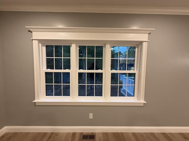 24 Cooper Rd, Webster, MA 01570 - detailed view of baseboards, ornamental molding, and wood finished floors