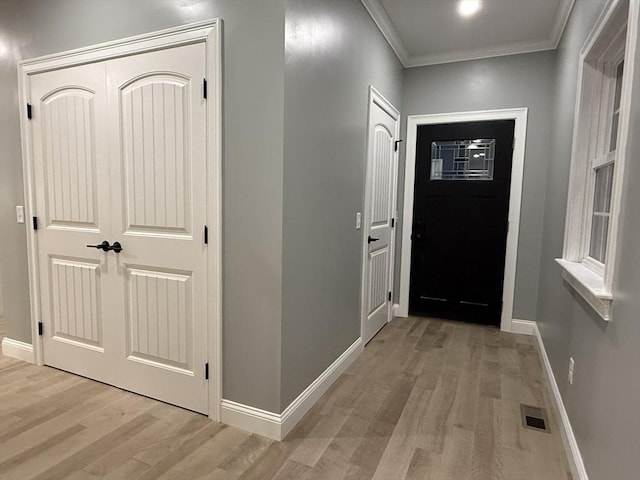 24 Cooper Rd, Webster, MA 01570 - entryway featuring light wood-style floors, crown molding, and baseboards