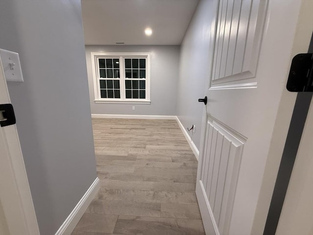 24 Cooper Rd, Webster, MA 01570 - corridor featuring baseboards, wood finished floors, and recessed lighting