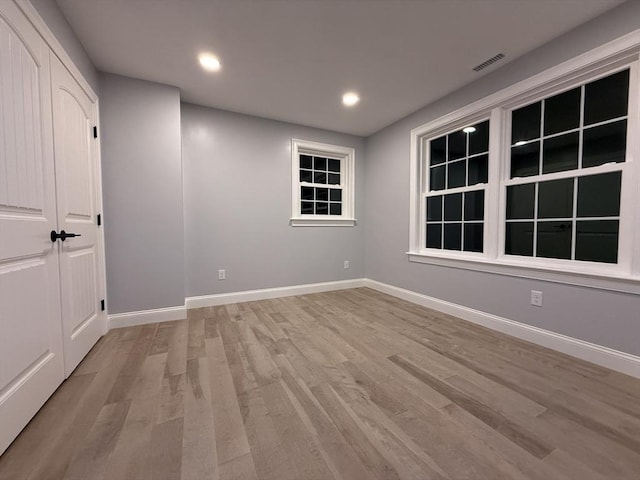 24 Cooper Rd, Webster, MA 01570 - unfurnished room with light wood finished floors, baseboards, and recessed lighting