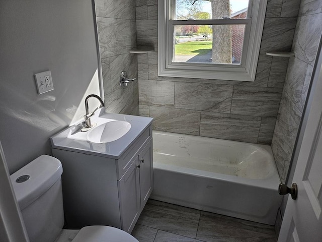 full bath with vanity, shower / bathing tub combination, and toilet