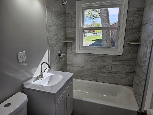 full bathroom with shower / bathtub combination, toilet, and vanity