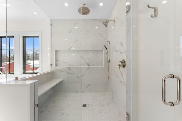 bathroom featuring an enclosed shower