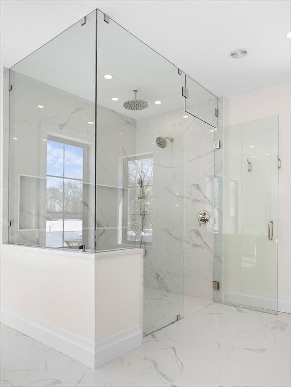 bathroom featuring an enclosed shower