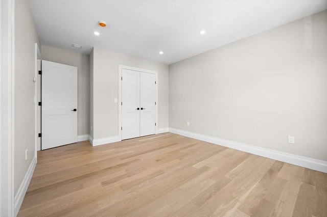 unfurnished bedroom featuring light hardwood / wood-style floors