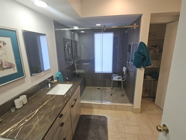 bathroom with vanity and walk in shower