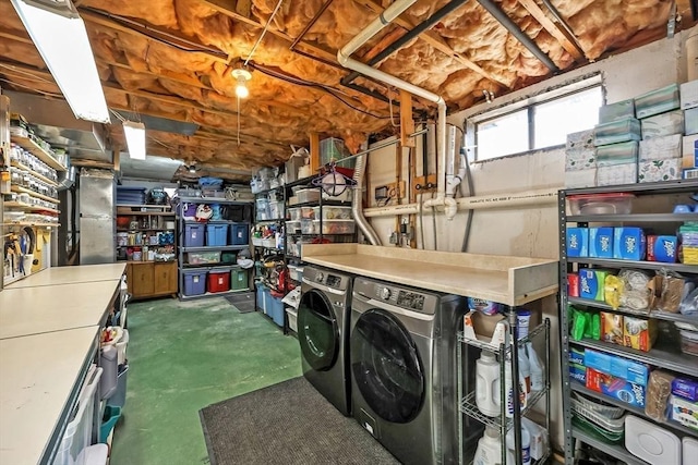 basement featuring washing machine and dryer