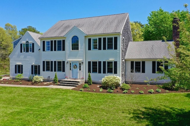 116 Fairview Ln, Plymouth, MA 02360 - colonial house featuring a front lawn and a shingled roof