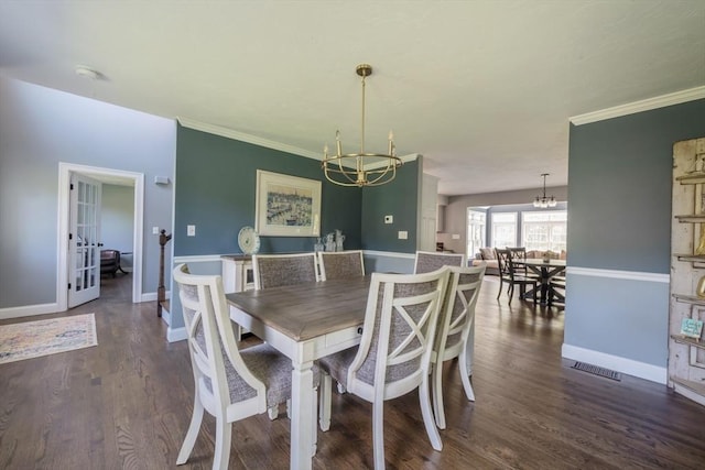 116 Fairview Ln, Plymouth, MA 02360 - dining space featuring a chandelier, baseboards, dark wood finished floors, crown molding, and french doors