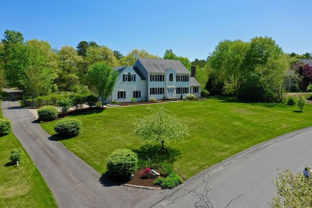 116 Fairview Ln, Plymouth, MA 02360 - colonial house with a front yard and a chimney