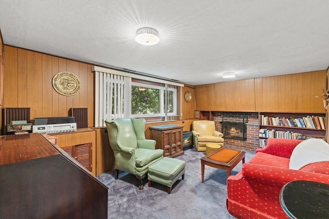 16 Fencourt, Canton, MA 02021 - carpeted living area with wooden walls and a brick fireplace