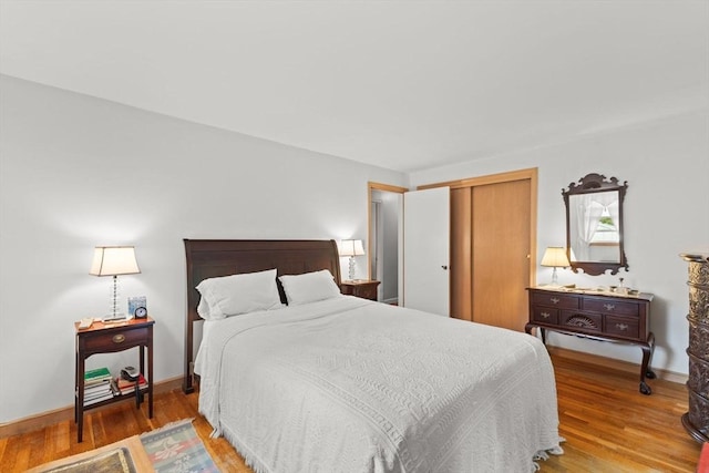 16 Fencourt, Canton, MA 02021 - bedroom featuring light wood finished floors, a closet, and baseboards
