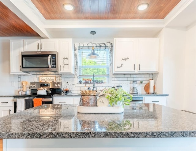 kitchen featuring decorative light fixtures, stainless steel appliances, decorative backsplash, white cabinetry, and wooden ceiling