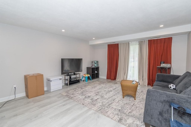 170 Highland St Unit 119D, Taunton, MA 02780 - living room with light wood-style floors, recessed lighting, and baseboards