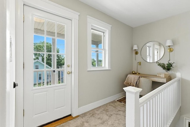 216 Cedar St Unit 3, Somerville, MA 02144 - doorway with baseboards and carpet floors
