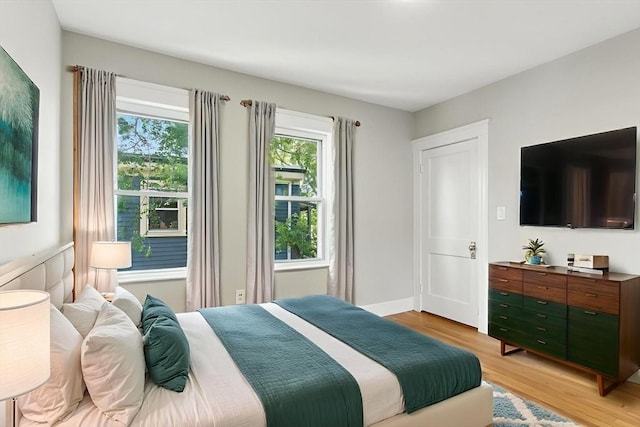 216 Cedar St Unit 3, Somerville, MA 02144 - bedroom featuring light wood-style floors and baseboards