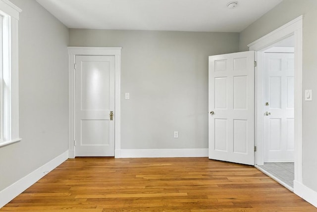216 Cedar St Unit 3, Somerville, MA 02144 - unfurnished bedroom featuring light wood-style floors