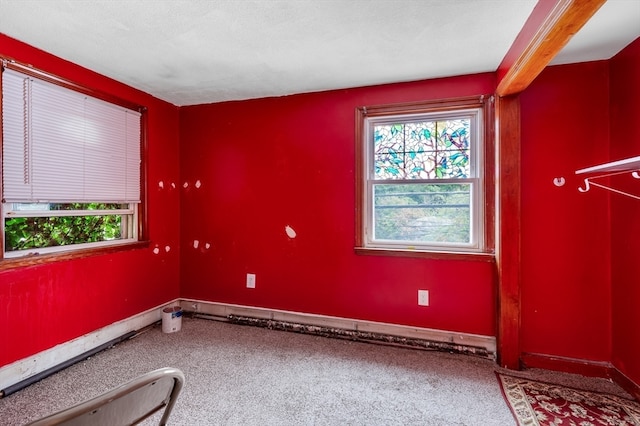 spare room featuring a textured ceiling