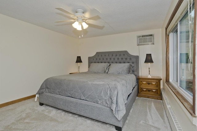 12 Allen St, Chicopee, MA 01020 - bedroom featuring carpet, multiple windows, an AC wall unit, and a ceiling fan
