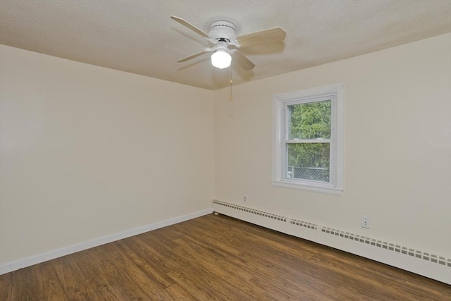 12 Allen St, Chicopee, MA 01020 - empty room featuring baseboard heating, dark wood-type flooring, and a ceiling fan