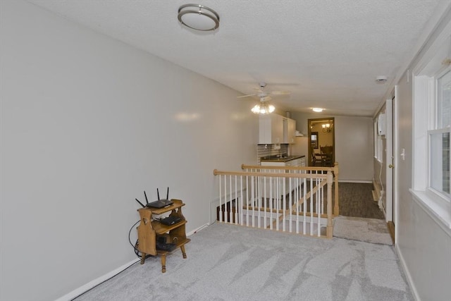 12 Allen St, Chicopee, MA 01020 - carpeted spare room featuring a ceiling fan and a textured ceiling