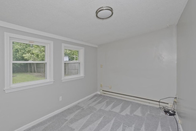 12 Allen St, Chicopee, MA 01020 - carpeted empty room featuring a textured ceiling and a baseboard heating unit