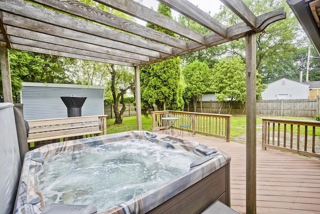 12 Allen St, Chicopee, MA 01020 - wooden terrace featuring a hot tub, a fenced backyard, and a shed