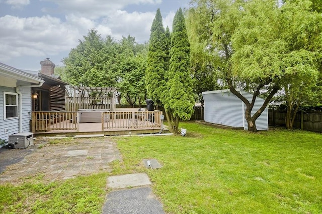 12 Allen St, Chicopee, MA 01020 - fenced backyard with a deck and a shed