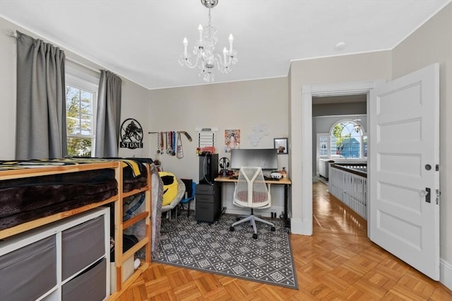 office with a chandelier and healthy amount of natural light