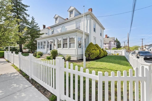 view of front of home with a chimney