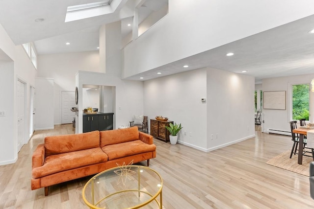 11 Running Stream Rd, Rehoboth, MA 02769 - living room featuring a high ceiling, light wood-style floors, recessed lighting, and a skylight