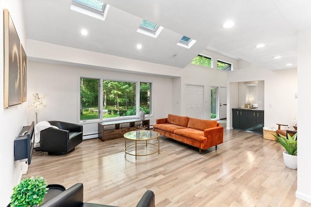 11 Running Stream Rd, Rehoboth, MA 02769 - living room with a skylight, high vaulted ceiling, light wood finished floors, baseboard heating, and recessed lighting