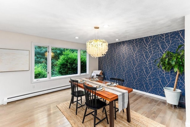 11 Running Stream Rd, Rehoboth, MA 02769 - dining space featuring a baseboard radiator, a chandelier, wood finished floors, recessed lighting, and an accent wall