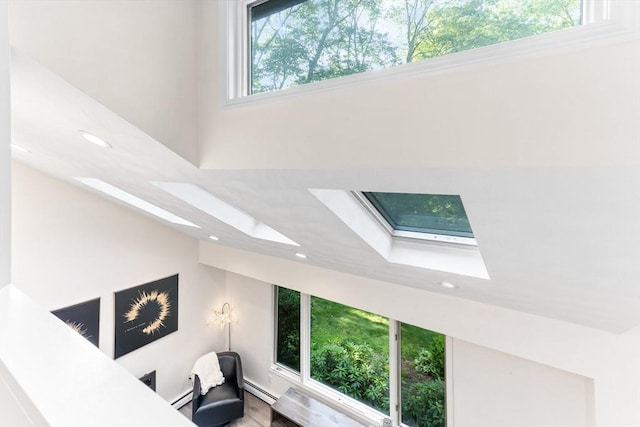 11 Running Stream Rd, Rehoboth, MA 02769 - detailed view of a skylight, a baseboard heating unit, and recessed lighting