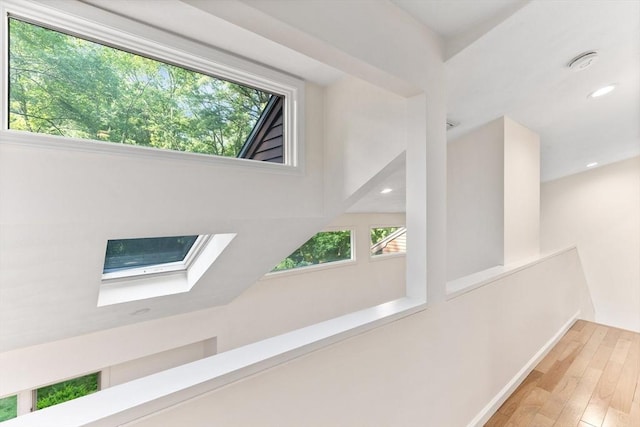 11 Running Stream Rd, Rehoboth, MA 02769 - corridor featuring a skylight, wood-type flooring, and recessed lighting