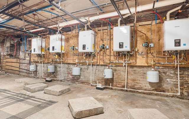 utility room featuring water heater