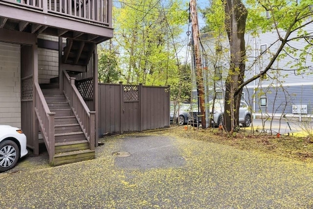 view of property exterior with stairs